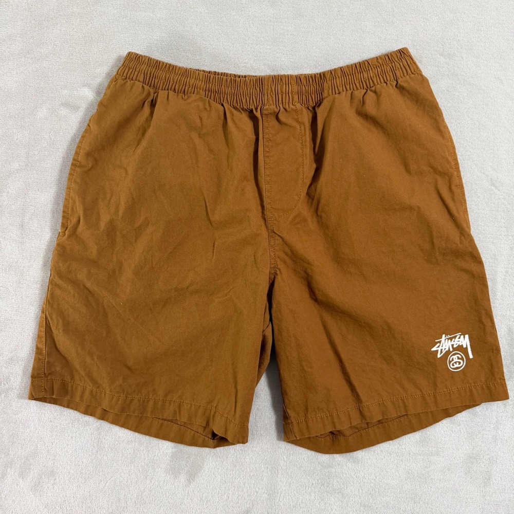 Stussy Men's Flat Front Shorts in Rust Brown with White Logo